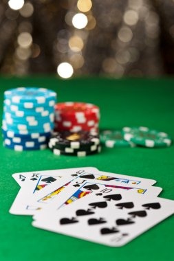 Mobile phone displaying redeem Quickspin live baccarat table with dealer and player seats